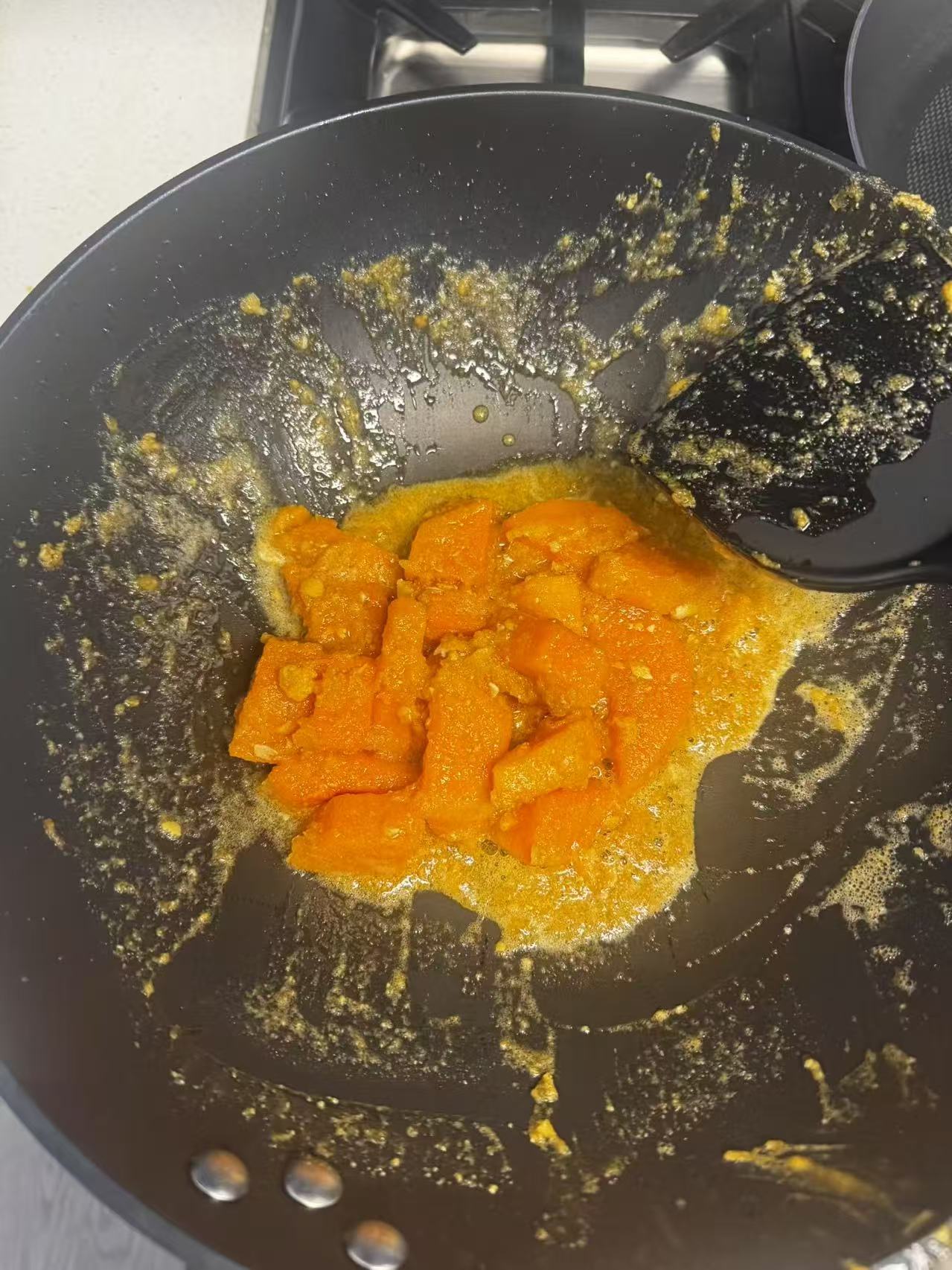 Pumpkin cooking in a pan
