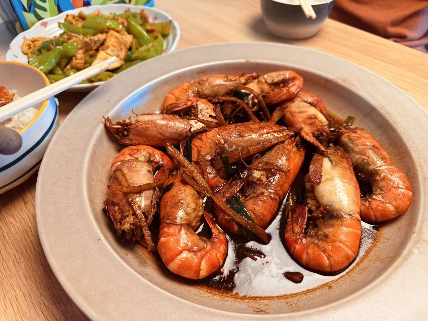 Soy-glazed shrimp on a serving plate