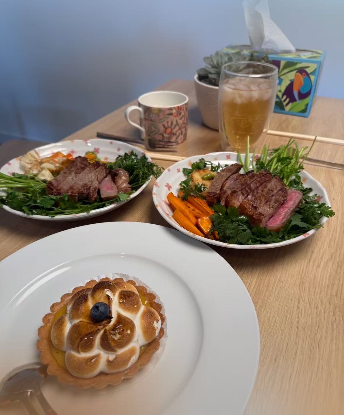 Steak dinner with vegetables and homemade bread